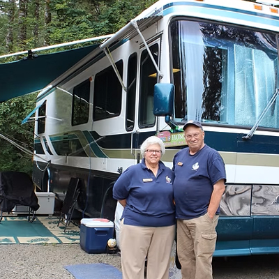 Camp host volunteers in forest