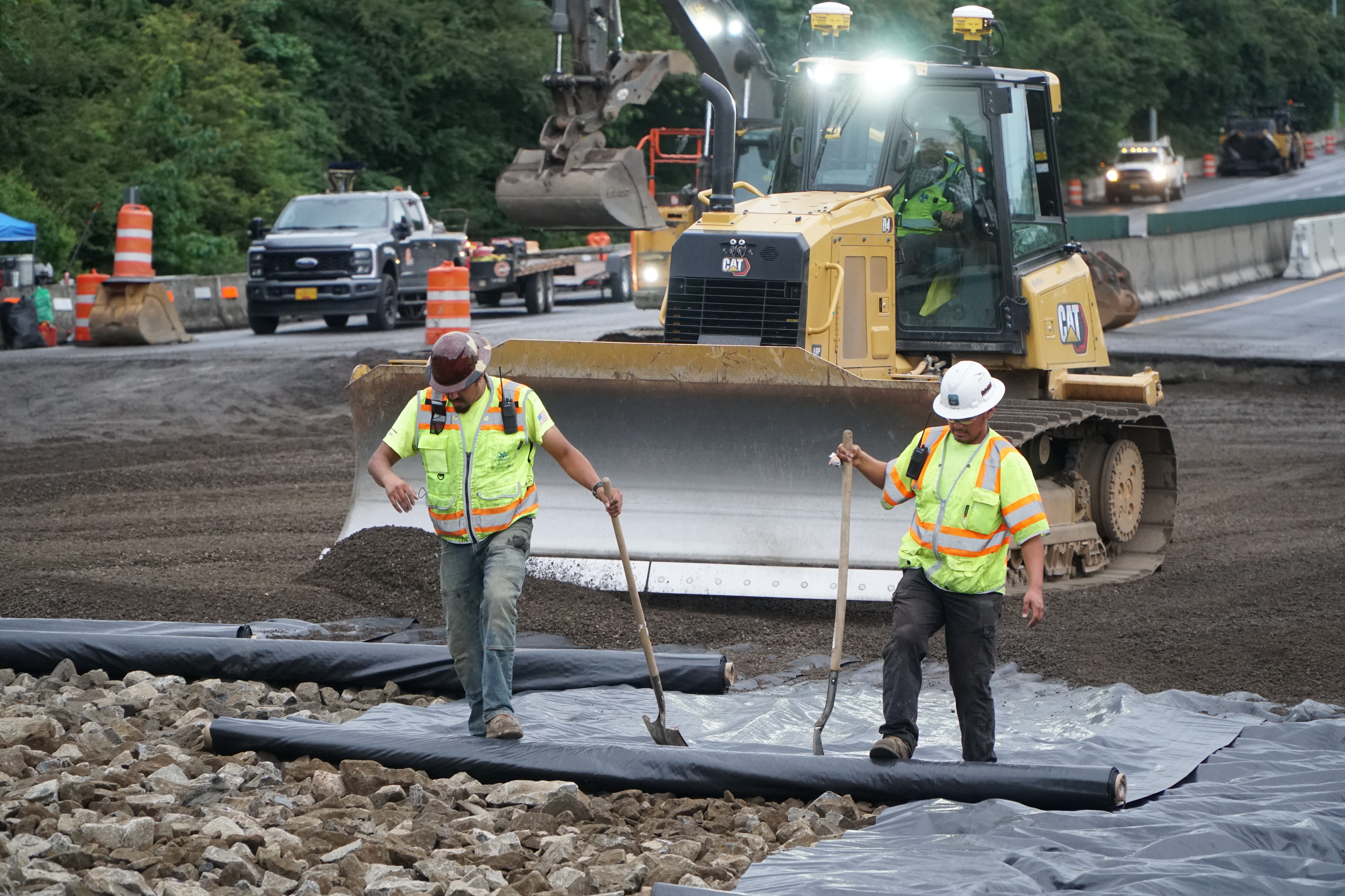 Crews preparing the roadway to add new asphalt paving on Saturday