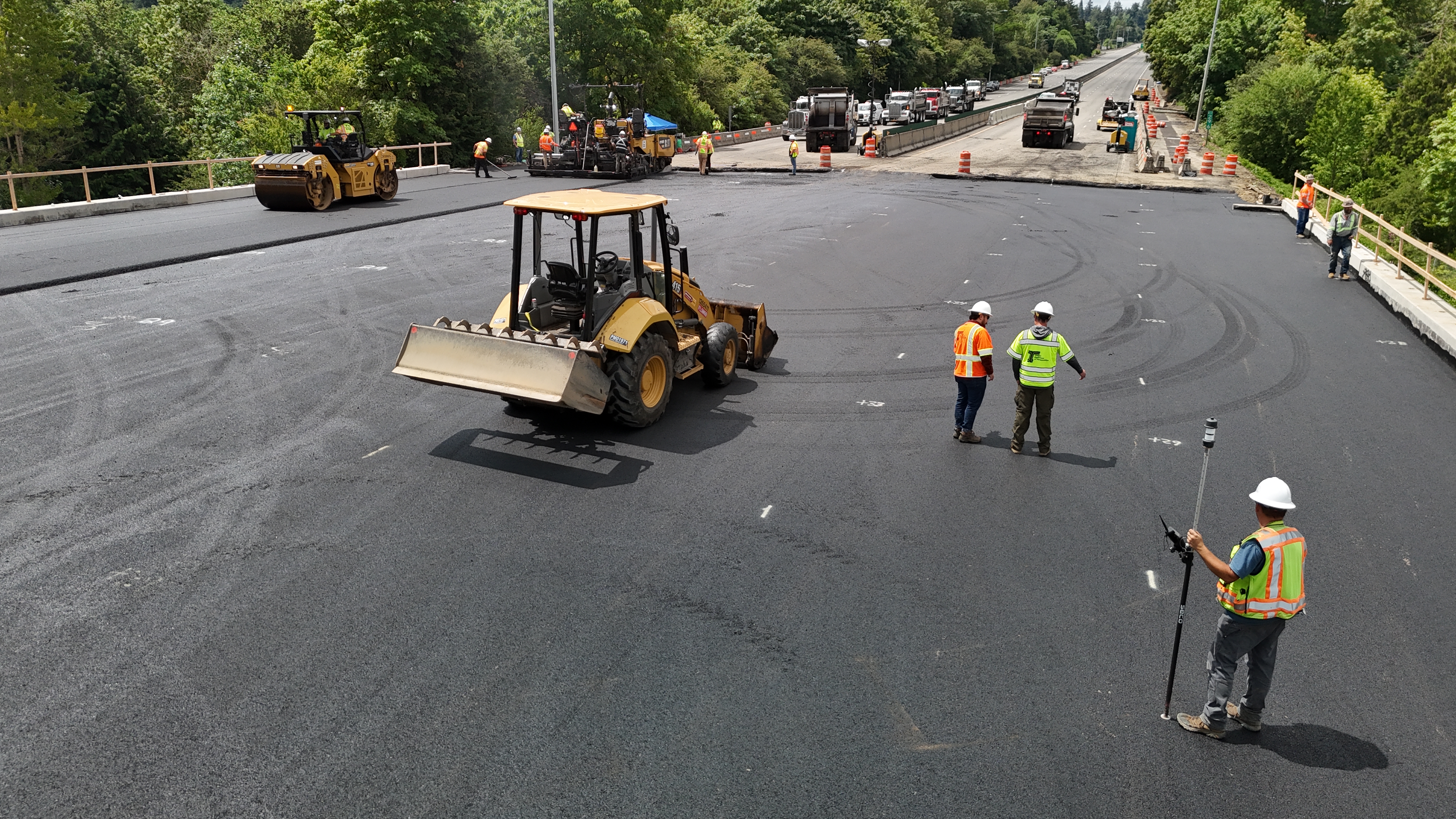 Progress of adding new asphalt paving Sunday afternoon.
