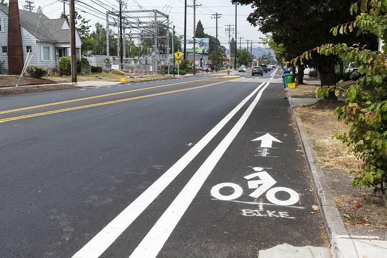 Photo of a local raod with a bike lane. 